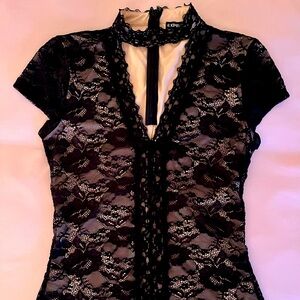Express black floral lace, nude lining. V-neck choker hidden zipper in the back.
